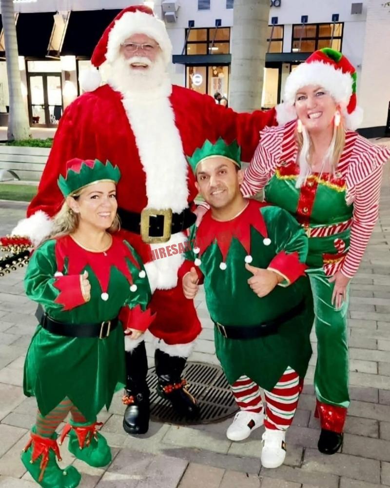Santa for a Long Island, NY program at dusk with elves, ready for a house or hall